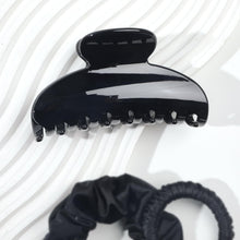 Load image into Gallery viewer, Black Hair Claw Clip for Women, Premium PC Material for Long-Term Use, 4.1 Inch Big Strong Hold No Slip Hair Clips for Thick or Thin Hair, Includes 2 Black Satin Scrunchies
